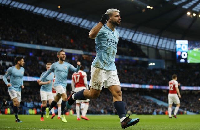 Sergio Aguero celebrates the first of his three goals in Manchester City's win over Arsenal (Nick Potts/PA).