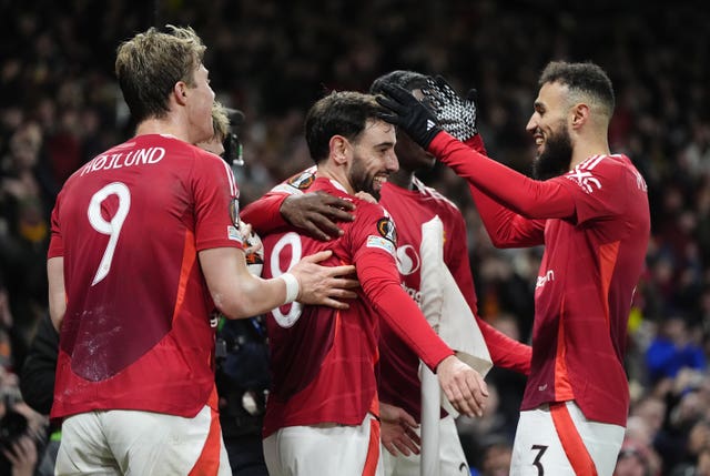 Manchester United’s Bruno Fernandes (centre) celebrates with team-mates