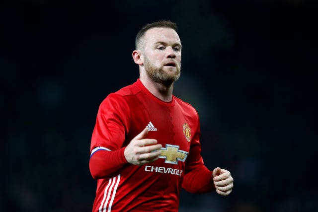 Wayne Rooney feels the mood at Old Trafford has already improved (Martin Rickett/PA).