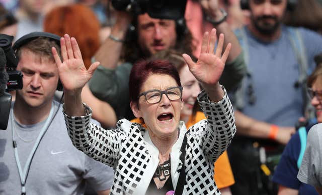 Campaigner Ailbhe Smyth takes the acclaim of the crowd at Dublin Castle (Niall Carson/PA)
