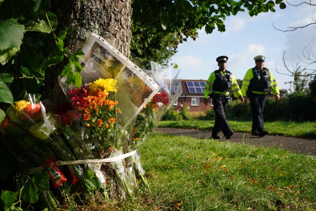 Flowers for a victim of the Plymouth incident which was linked to incel culture (Ben Birchall/PA)