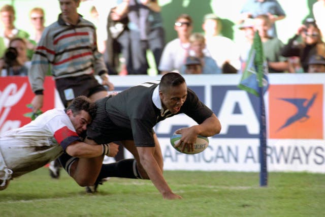 Jonah Lomu scores a try for New Zealand in the 1995 World Cup semi-final