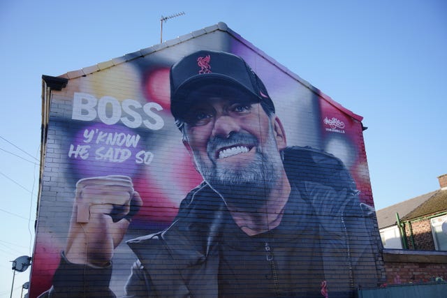 A mural paying tribute to Jurgen Klopp featuring the words 'Boss, y'know he said so' in Randolph Street, near Anfield