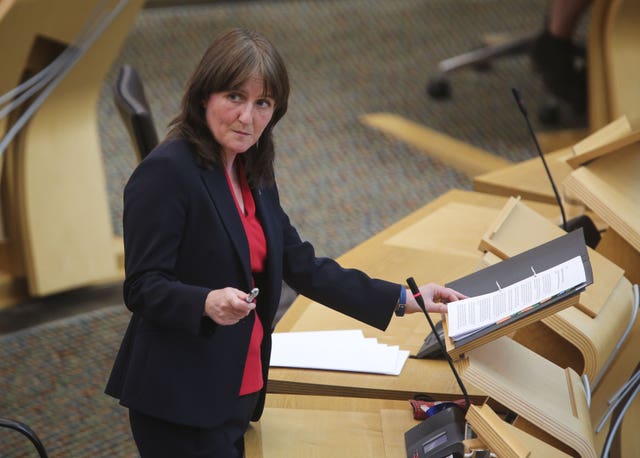 Maree Todd standing while speaking in Holyrood