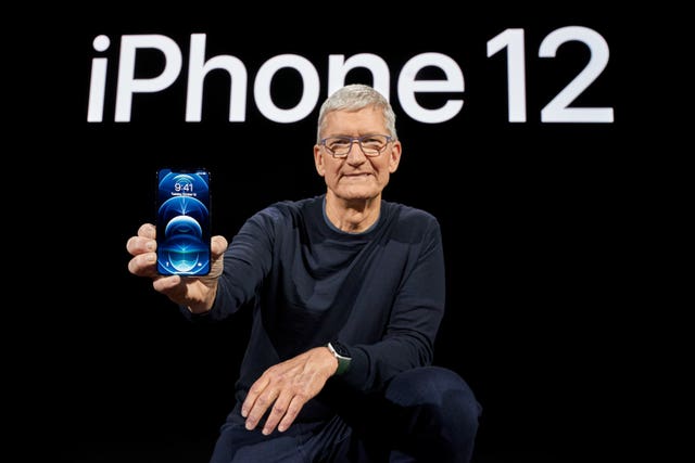 Tim Cook with the iPhone 12