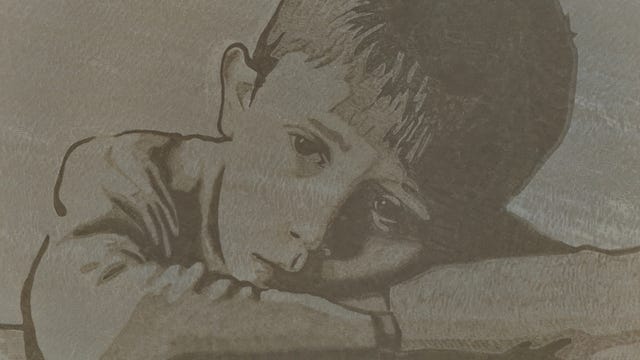 A giant sand portrait of a child