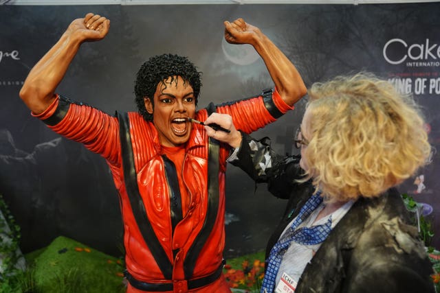 Cake artist Emma Jayne works on her life size replica of Michael Jackson