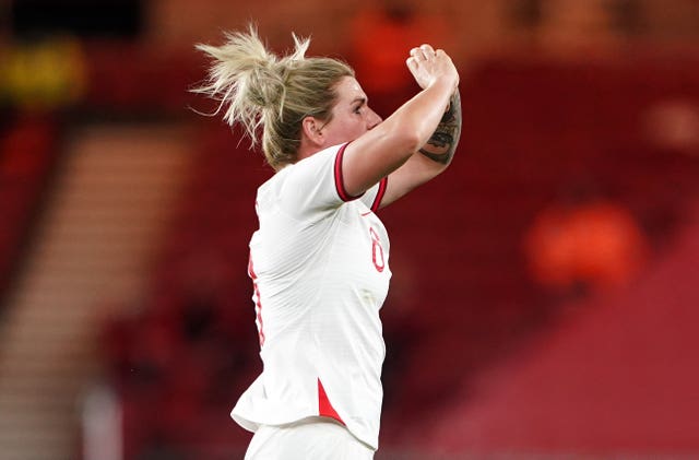 Millie Bright celebrates scoring against Canada 