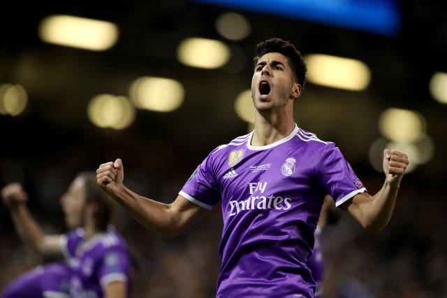 Real Madrid’s Marco Asensio celebrates scoring his side’s fourth goal of the game during the UEFA Champions League Final at the National Stadium, Cardiff