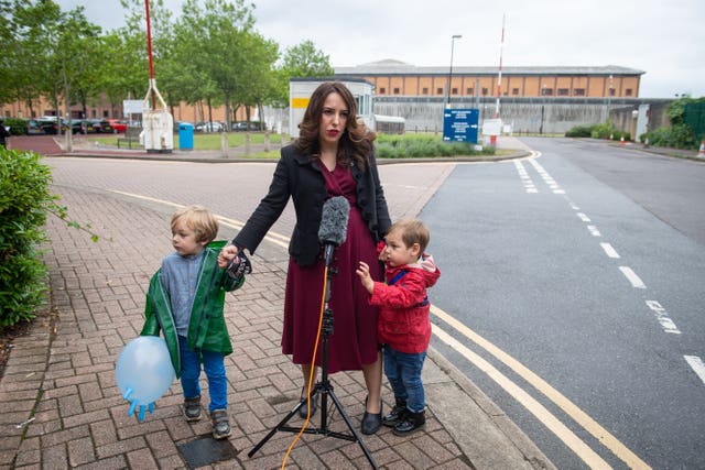 Stella Moris stands with her children Gabriel, four, (left) and Max, two, as she speaks to the media outside Belmarsh Prison, London, following a visit to her partner and their father Julian Assange (Dominic Lipinski/PA)