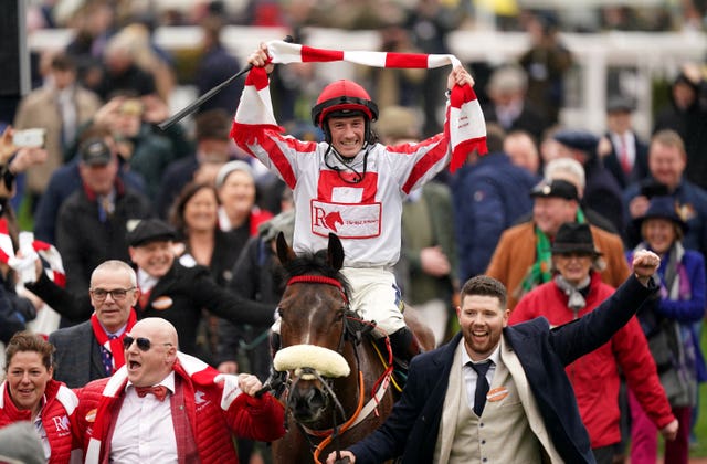 Sam Twiston-Davies celebrates winning the Brown Advisory Novices’ Chase aboard The Real Whacker 