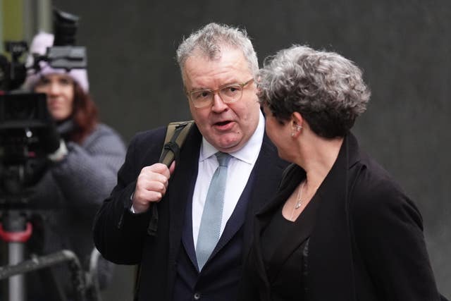 Lord Tom Watson outside court