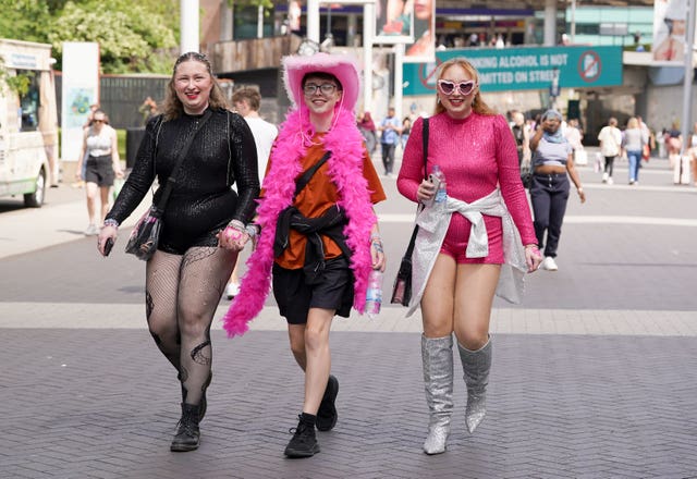 Taylor Swift fans arrive at Wembley Stadium in pink outfits