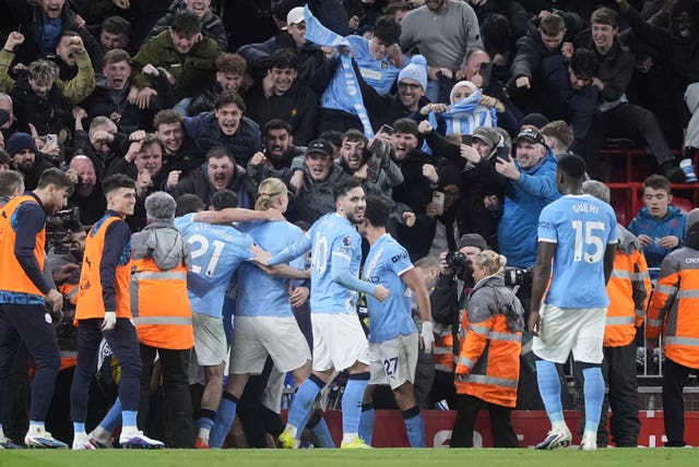 Erling Haaland celebrates at Anfield