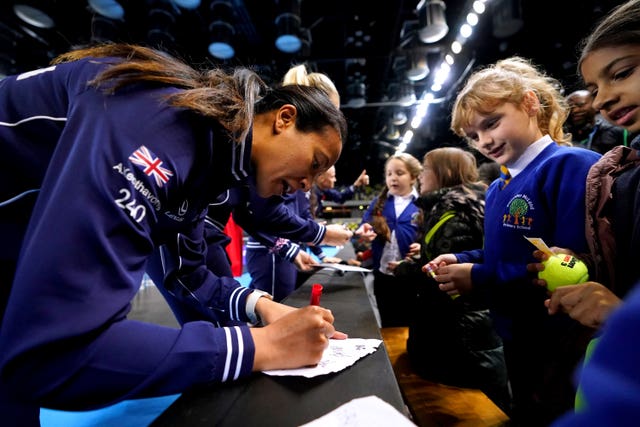 Great Britain captain Anne Keothavong signs autographs for local schoolchildren at the Copper Box