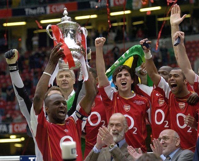 Arsenal celebrate beating Manchester United in the FA Cup final (Rebecca Naden/PA)