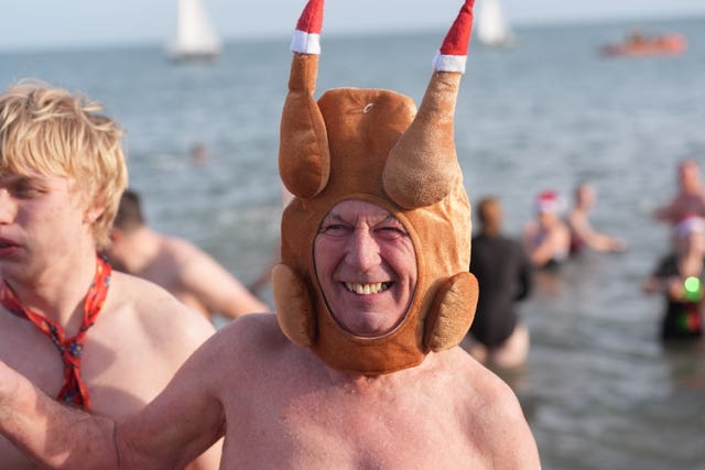 Swimmers take part in the annual New Year’s Day charity swim on Bray seafront in County Wicklow