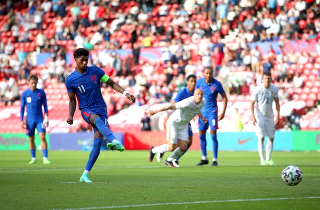 Marcus Rashford slots home from the penalty spot