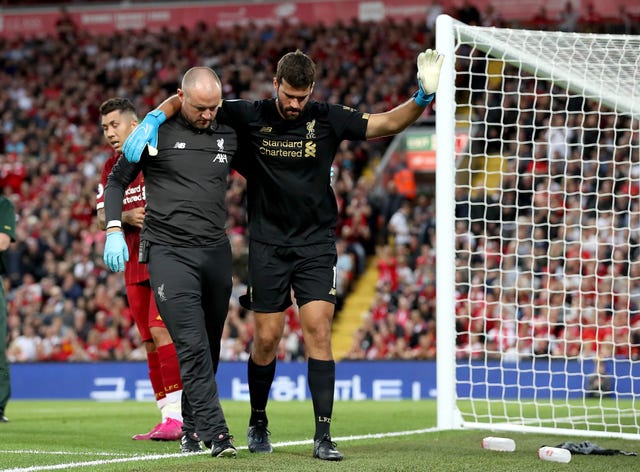 Liverpool impress against newly-promoted Norwich but Alisson hobbles off