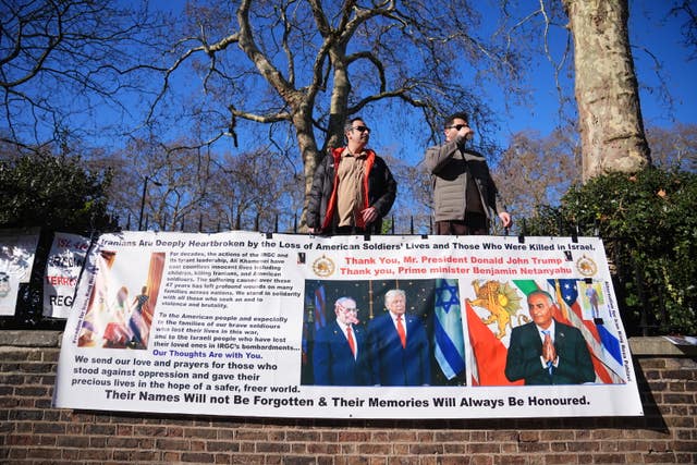 People take part in a Stage for Freedom demonstration outside the Iranian Embassy in central London