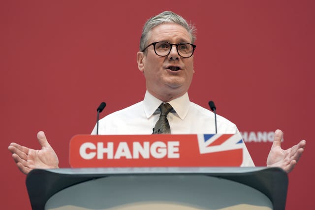 Sir Keir Starmer speaking behind a podium with the word 'Change' on it as he delivers a speech at Labour's manifesto launch