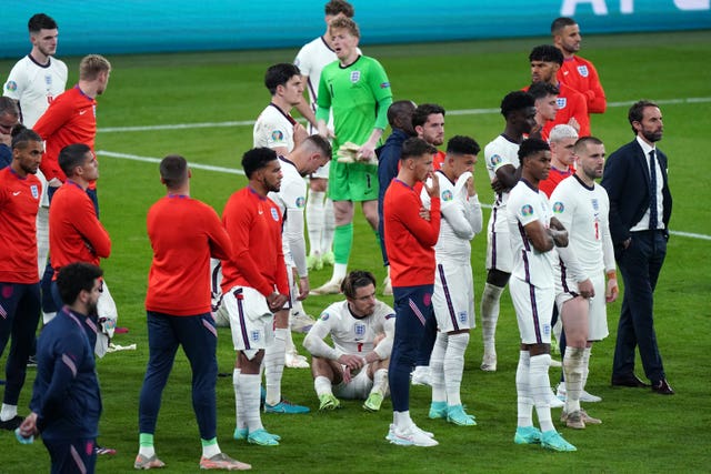 England’s players are crest-fallen after losing to Italy on penalties in the Euro 2020 final at Wembley