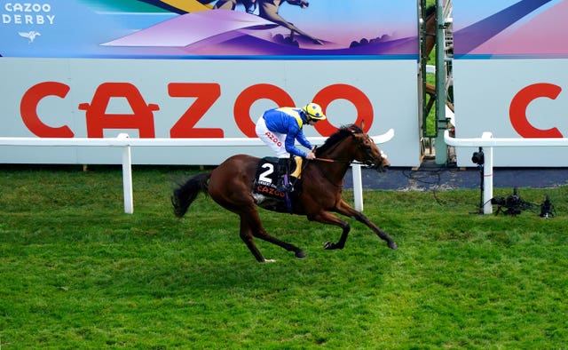 Desert Crown crossing the line at Epsom