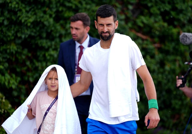 Novak Djokovic and his daughter Tara on day seven of Wimbledon 