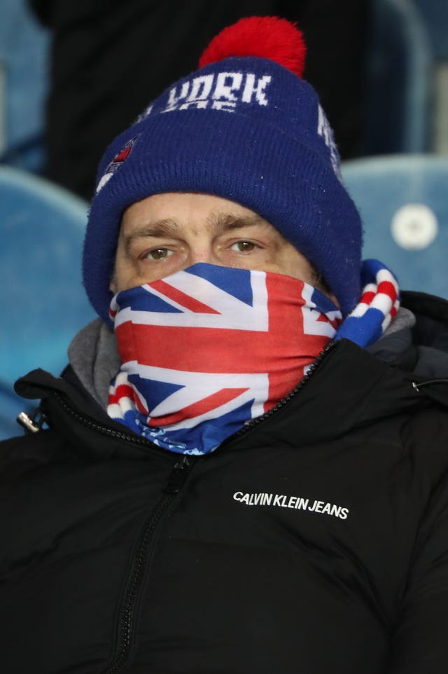 A Rangers fan wore an improvised mask ahead of the European tie