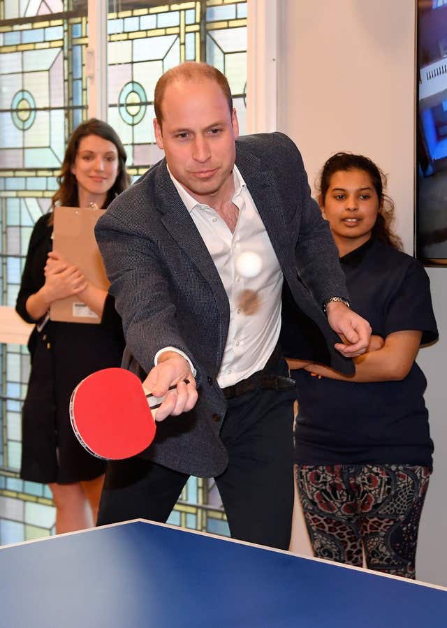 William plays table tennis at the Greenhouse Centre in London (Toby Melville/PA)