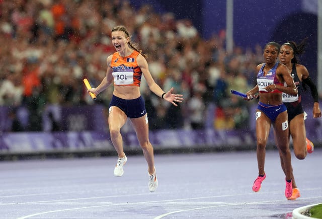 Femke Bol celebrating crossing the finish line