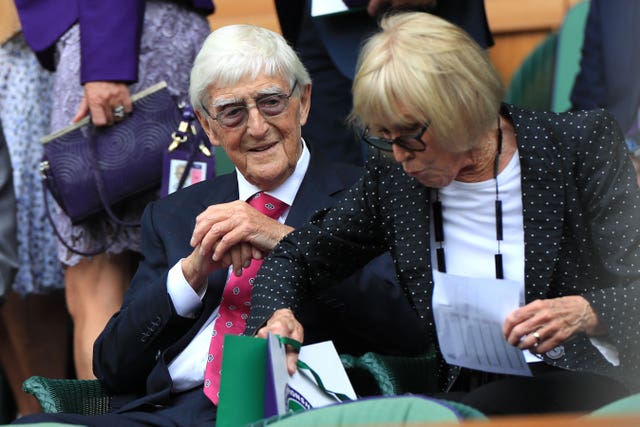 Broadcaster and author Sir Michael Parkinson, left