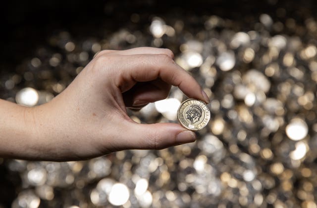 The new pressing of the £1 coin bearing the King’s official portrait