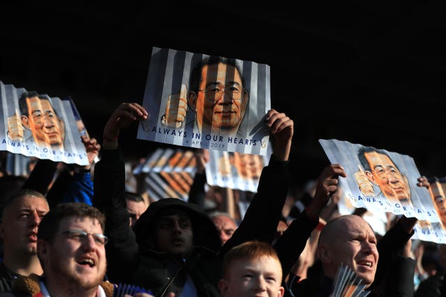 Leicester City fans hold up banners in honour of late chairman Vichai Srivaddhanaprabha (Mike Egerton/PA)