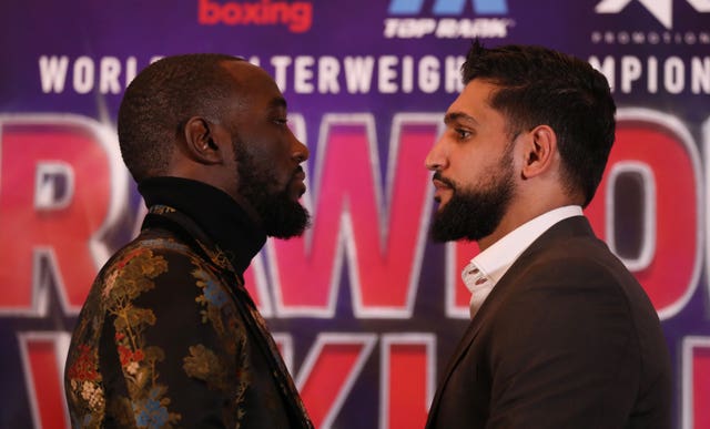 Amir Khan, right, has been training alongside former opponent Terence Crawford (Isabel Infantes/PA)