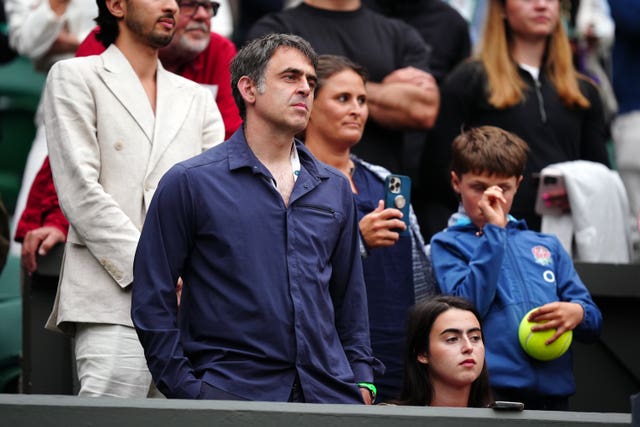 Ronnie O’Sullivan watches on from the Wimbledon crowd