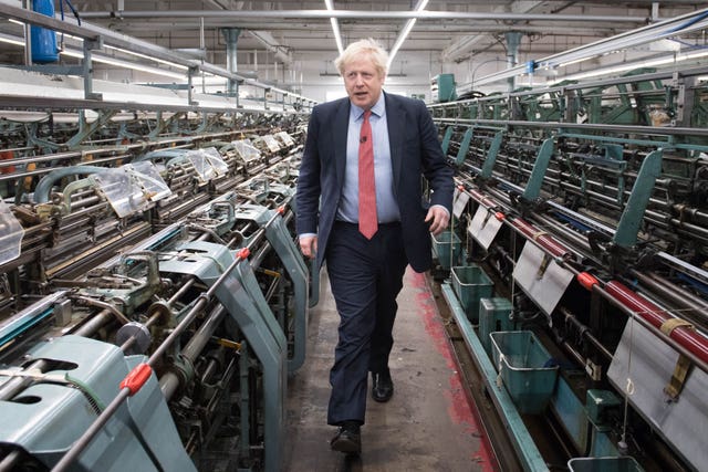 Prime Minister Boris Johnson during a visit to the John Smedley Mill in Matlock, Derbyshire