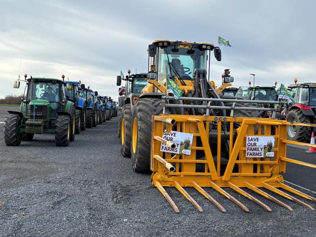 Farmers gather in tractors at the Maze site close to Lisburn, Co Antrim, for one of seven protest tractor runs across Northern Ireland 