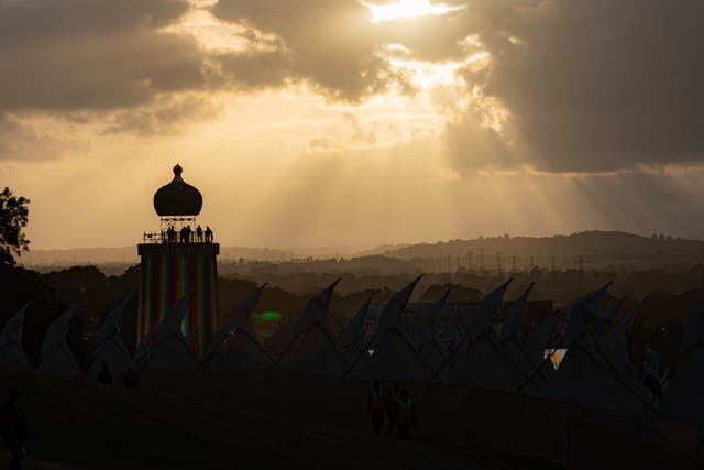 Sunset over the ribbon tower at the Glastonbury Festival 