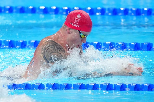 Adam Peaty competes in Paris