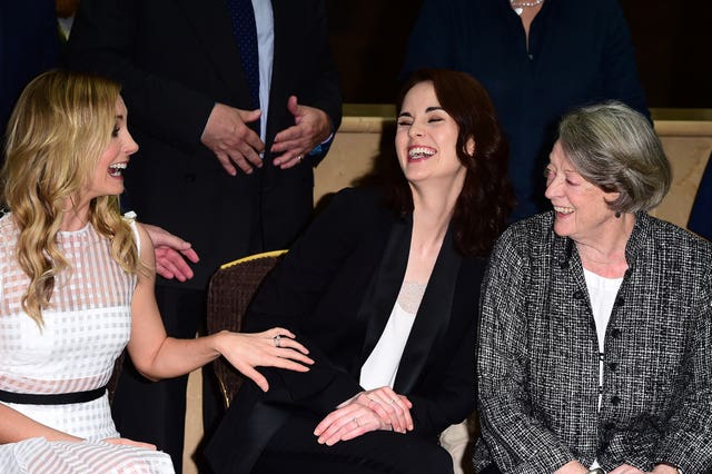 Joanne Froggatt, Michelle Dockery and Dame Maggie Smith laughing together