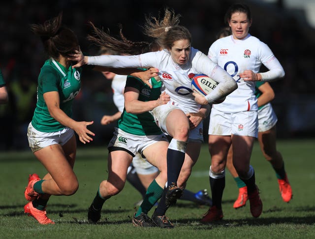 England wing Abby Dow attempts to escape the attentions Ireland pair Sene Naoupu and Clair Keohane during the Women's Six Nations. Dow was one of five English try-scorers during a resounding 27-0 success in February at Castle Park, Doncaster. England eventually went on to complete a tournament Grand Slam after completing their fixtures in November following postponements caused by Covid-19