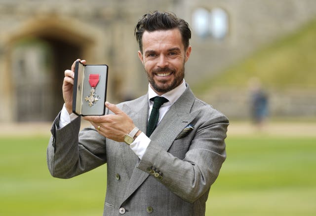 Oliver Jeffers after being made a MBE at an investiture ceremony at Windsor Castle