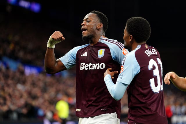 Jhon Duran clenches his fist to celebrate scoring Villa's second goal