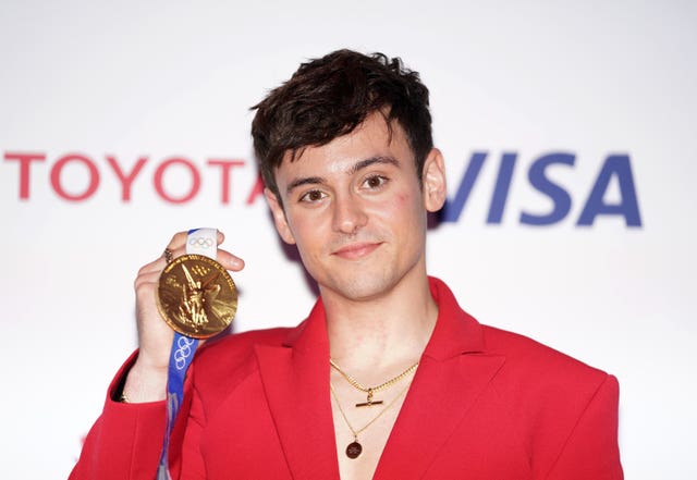 Tom Daley with his Olympic gold medal at the Team GB Ball