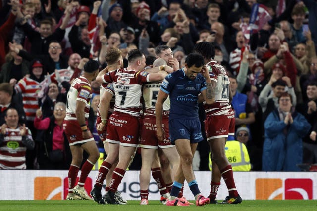 Wigan Warriors celebrate after the hooter