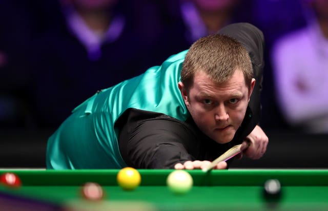 Mark Allen lines up a shot during his Masters quarter-final with Ronnie O'Sullivan