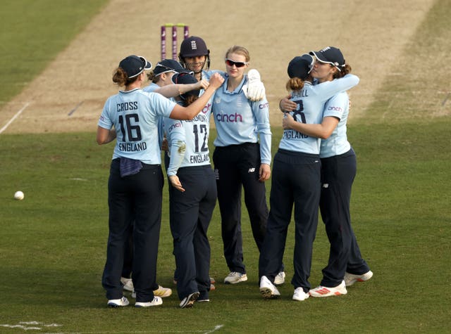England's Charlie Dean and Tammy Beaumont celebrate with their team-mates