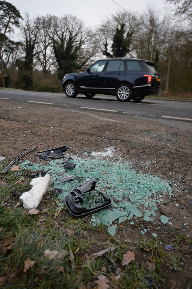 Broken glass and car parts litter the side of the A-road where the duke had his accident. John Stillwell/PA Wire