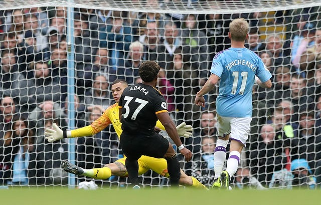 Adama Traore scored twice as Premier League champions Manchester City suffered a shock 2-0 home defeat by Wolves.